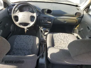 1996 Hyundai Accent z VIN KMHVF14N4TU316378, wystawiony jako Copart lot #88981945 z przebiegiem 128 650 mil mil oraz Tytuł czysty. Historia ofert i sprzedaży dostępna na DreamBid. Obrazek 8.
