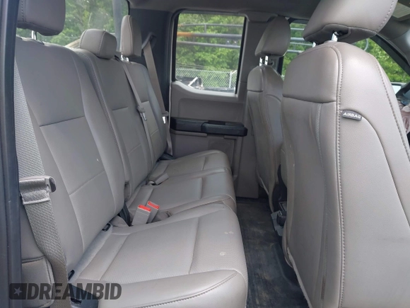 2018 Ford F-150 XL with VIN 1FTEX1CB5JFE55932, listed as a IAAI auction lot 42298917 with 143,923 mi miles and . Bid and sale history available at DreamBid. Image 8.