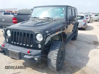2015 Jeep Wrangler Unlimited Rubicon z VIN 1C4BJWFG2FL572417, wystawiony jako IAAI lot #41895927 z przebiegiem 54 981 mil mil oraz . Historia ofert i sprzedaży dostępna na DreamBid. Obrazek 17.