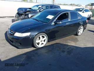 2006 Acura TSX with VIN JH4CL96896C006942, listed as a IAAI auction lot 42262503 with 228,399 mi miles and . Bid and sale history available at DreamBid. Image 2.