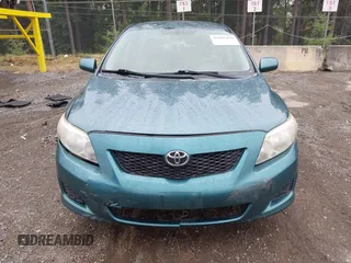 2010 Toyota Corolla with VIN 1NXBU4EE3AZ165944, listed as a IAAI auction lot 42597459 with 211,824 mi miles and . Bid and sale history available at DreamBid. Image 12.