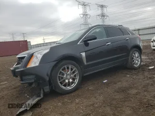 2014 Cadillac SRX Luxury Collection z VIN 3GYFNEE34ES685593, wystawiony jako Copart lot #52202805 z przebiegiem 139 869 mil mil oraz Szkody całkowita. Historia ofert i sprzedaży dostępna na DreamBid. Obrazek 1.