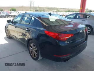 2013 Kia Optima EX with VIN 5XXGN4A75DG204221, listed as a IAAI auction lot 42081408 with 196,760 mi miles. Bid and sale history available at carsss.com. Image 3.