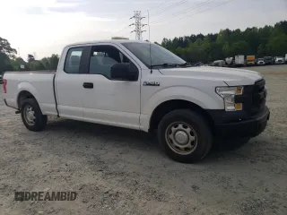 2015 Ford F-150 XL with VIN 1FTEX1C80FFB62967, listed as a Copart auction lot 52552435 with 154,977 mi miles and Salvage title. Bid and sale history available at DreamBid. Image 4.
