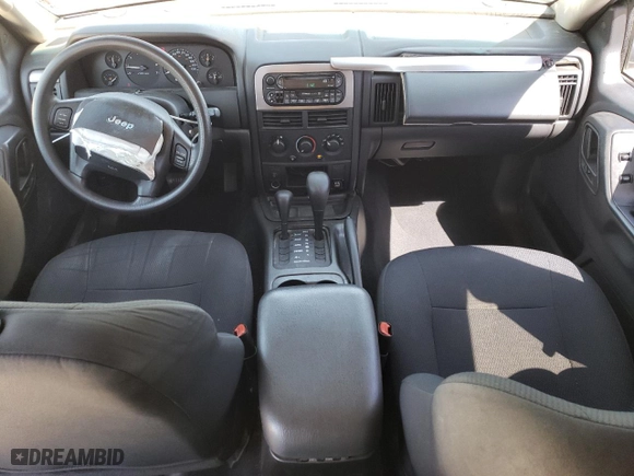 2003 Jeep Grand Cherokee Laredo with VIN 1J4GW48SX3C589100, listed as a Copart auction lot 49986745 with 247,687 mi miles and Salvage Title. Bid and sale history available at carsss.com. Image 8.