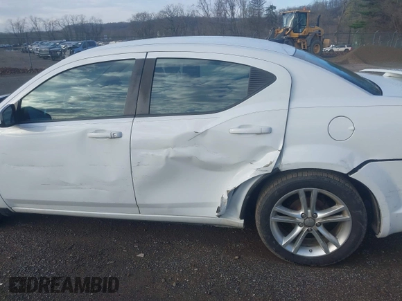2013 Dodge Avenger SXT with VIN 1C3CDZCB0DN548158, listed as a IAAI auction lot 41969453 with 146,304 mi miles and . Bid and sale history available at DreamBid. Image 6.