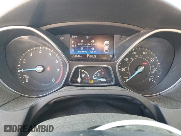2016 Ford Focus SE z VIN 1FADP3F2XGL261707, wystawiony jako Copart lot #59078565 z przebiegiem 79 820 mil mil oraz Szkoda całkowita • Salvage title. Historia ofert i sprzedaży dostępna na DreamBid. Obrazek 9.