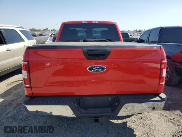 2019 Ford F-150 XL with VIN 1FTMF1E57KKC36789, listed as a Copart auction lot 69457224 with 26,509 mi miles and Salvage title. Bid and sale history available at DreamBid. Image 6.