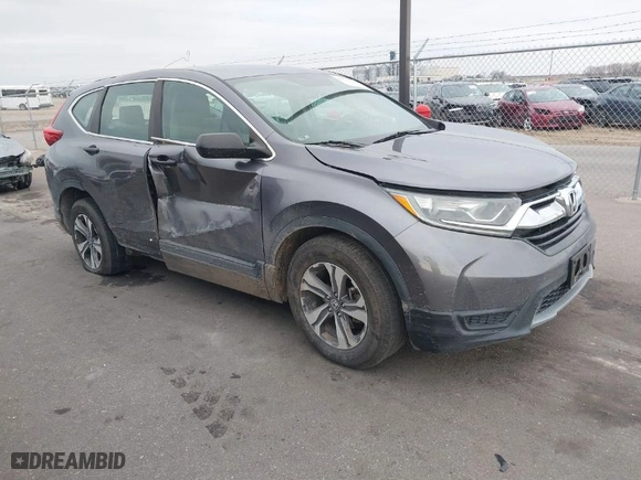 2017 Honda CR-V LX with VIN 7FARW5H32HE002156, listed as a IAAI auction lot 41697635 with 68,125 mi miles. Bid and sale history available at carsss.com. Image 1.