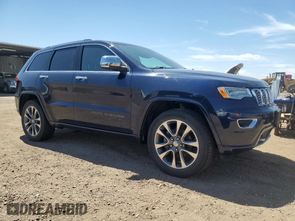2017 Jeep Grand Cherokee Overland with VIN 1C4RJFCG0HC943029, listed as a Copart auction lot 63073985 with 100,550 mi miles and Clean title. Bid and sale history available at DreamBid. Image 4.