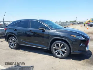 2016 Lexus RX 350 z VIN 2T2ZZMCA2GC031660, wystawiony jako IAAI lot #42460584 z przebiegiem 90 978 mil mil oraz . Historia ofert i sprzedaży dostępna na DreamBid. Obrazek 13.