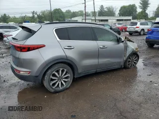 2018 Kia Sportage EX z VIN KNDPN3AC6J7364541, wystawiony jako Copart lot #56382695 z przebiegiem Nie podano mil oraz Szkoda całkowita • Salvage title. Historia ofert i sprzedaży dostępna na DreamBid. Obrazek 3.