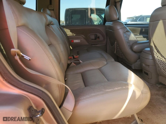 1996 Chevrolet Tahoe with VIN 1GNEK13R1TJ385350, listed as a Copart auction lot 77593884 with 169,178 mi miles and Salvage Title. Bid and sale history available at carsss.com. Image 11.
