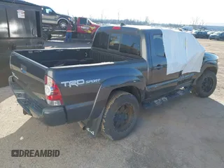 2014 Toyota Tacoma with VIN 3TMLU4EN0EM148389, listed as a IAAI auction lot 41490721 with 119,731 mi miles. Bid and sale history available at carsss.com. Image 4.