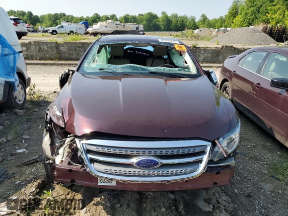 2011 Ford Taurus Limited with VIN 1FAHP2FW6BG157070, listed as a Copart auction lot 59300415 with 143,314 mi miles and Salvage title. Bid and sale history available at DreamBid. Image 5.