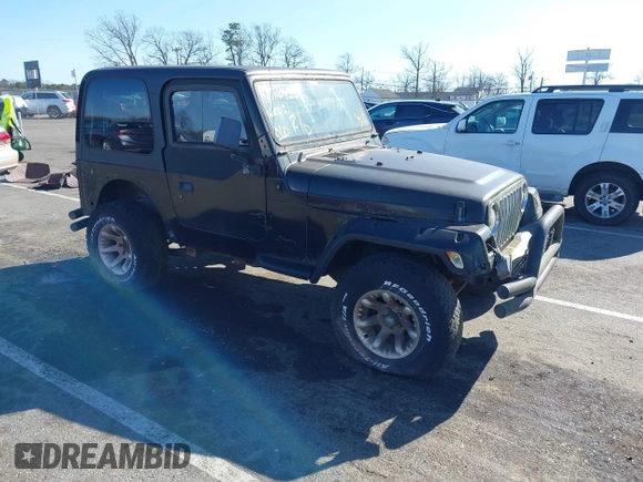 1997 Jeep Wrangler SE with VIN 1J4FY29P6VP438125, listed as a IAAI auction lot 41770455 with 163,001 mi miles. Bid and sale history available at carsss.com. Image 1.