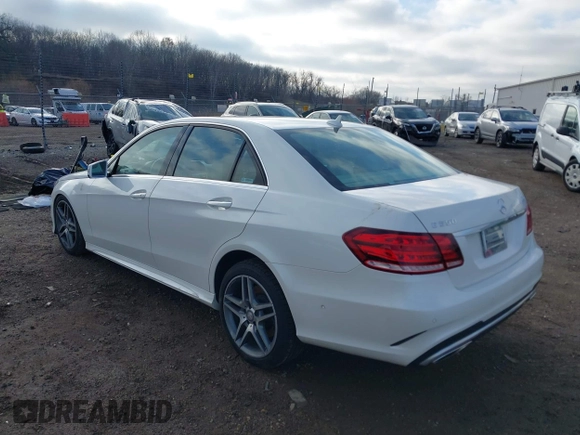 2014 Mercedes-Benz E 550 Sport with VIN WDDHF9BB5EA949457, listed as a IAAI auction lot 41128583 with 99,248 mi miles and . Bid and sale history available at DreamBid. Image 3.