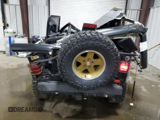 2006 Jeep Wrangler Sport z VIN 1J4FA49SX6P718734, wystawiony jako Copart lot #56516095 z przebiegiem 127 184 mil mil oraz Szkoda całkowita • Salvage title. Historia ofert i sprzedaży dostępna na DreamBid. Obrazek 6.