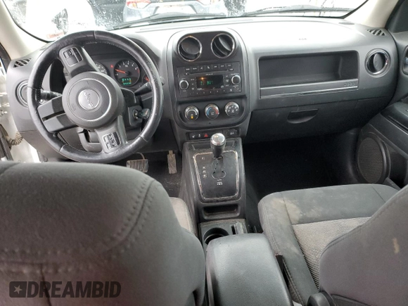 2011 Jeep Patriot Latitude with VIN 1J4NT1GB0BD105878, listed as a Copart auction lot 51964955 with 252,991 mi miles and Salvage Title. Bid and sale history available at carsss.com. Image 8.