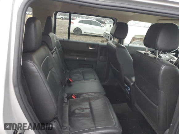 2015 Ford Flex Limited z VIN 2FMHK6D81FBA03699, wystawiony jako Copart lot #86915824 z przebiegiem 73 301 mil mil oraz Szkoda całkowita • Salvage title. Historia ofert i sprzedaży dostępna na DreamBid. Obrazek 11.