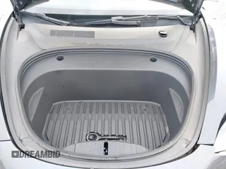 2022 Tesla Model 3 Long Range with VIN 5YJ3E1EB8NF201023, listed as a IAAI auction lot 41942943 with 30,635 mi miles and . Bid and sale history available at DreamBid. Image 10.