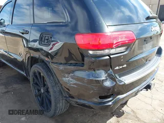 2014 Jeep Grand Cherokee Overland with VIN 1C4RJFCT8EC106005, listed as a IAAI auction lot 41989721 with 148,469 mi miles and . Bid and sale history available at DreamBid. Image 6.