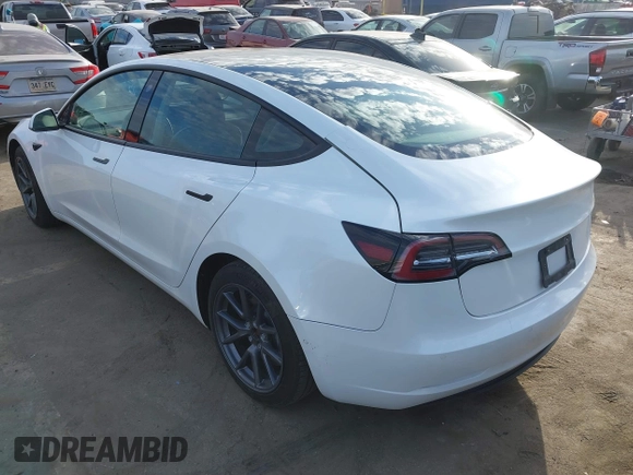 2022 Tesla Model 3 with VIN 5YJ3E1EA8NF210196, listed as a IAAI auction lot 41674407 with 24,270 mi miles. Bid and sale history available at carsss.com. Image 3.