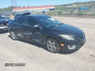 2009 Mazda 6 i Touring with VIN 1YVHP82A395M16573, listed as a IAAI auction lot 42122769 with 137,763 mi miles. Bid and sale history available at carsss.com. Image 1.