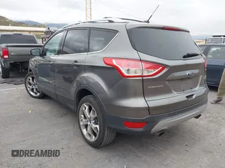 2013 Ford Escape Titanium with VIN 1FMCU0J95DUC71130, listed as a IAAI auction lot 42072032 with 144,054 mi miles and . Bid and sale history available at carsss.com. Image 3.