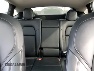 2021 Tesla Model Y Long Range with VIN 5YJYGDEEXMF217816, listed as a Copart auction lot 51008665 with 57,392 mi miles and Salvage Title. Bid and sale history available at DreamBid. Image 10.