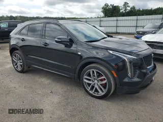 2021 Cadillac XT4 FWD Sport with VIN 1GYFZER42MF024204, listed as a Copart auction lot 63955904 with 31,262 mi miles and Salvage Title. Bid and sale history available at DreamBid. Image 4.
