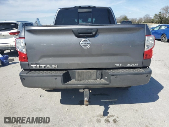 2018 Nissan Titan Pro-4X z VIN 1N6AA1E56JN505022, wystawiony jako Copart lot #50564285 z przebiegiem 249 986 mil mil oraz Szkoda całkowita • Salvage title. Historia ofert i sprzedaży dostępna na DreamBid. Obrazek 6.