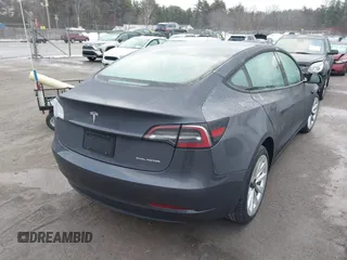 2023 Tesla Model 3 Long Range with VIN 5YJ3E1EB3PF389517, listed as a IAAI auction lot 41484978 with 13,411 mi miles and . Bid and sale history available at DreamBid. Image 4.