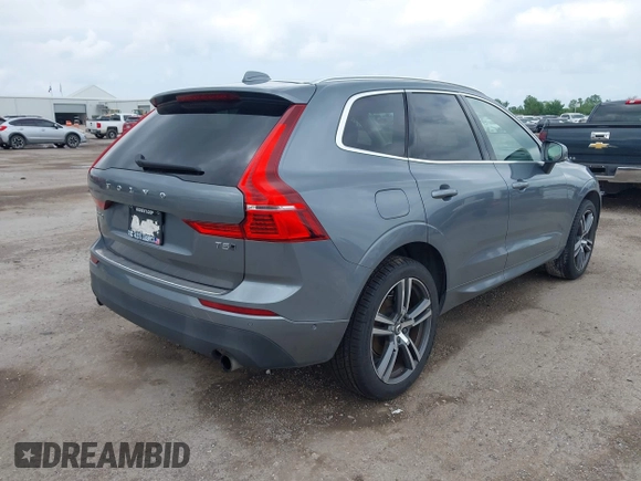 2018 Volvo XC60 Momentum z VIN LYV102RK1JB079168, wystawiony jako IAAI lot #42115403 z przebiegiem 58 377 mil mil oraz . Historia ofert i sprzedaży dostępna na DreamBid. Obrazek 4.