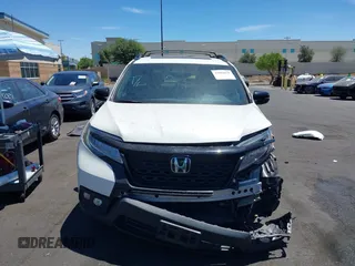 2019 Honda Passport Elite z VIN 5FNYF8H05KB009575, wystawiony jako IAAI lot #42804678 z przebiegiem 70 468 mil mil oraz . Historia ofert i sprzedaży dostępna na DreamBid. Obrazek 13.