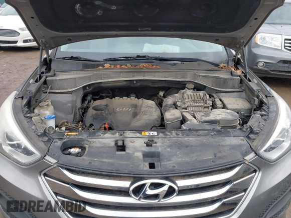 2016 Hyundai Santa Fe z VIN 5XYZTDLB1GG343763, wystawiony jako IAAI lot #41659641 z przebiegiem 96 415 mil mil oraz . Historia ofert i sprzedaży dostępna na DreamBid. Obrazek 10.