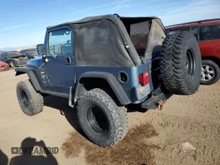 1998 Jeep Wrangler Sport with VIN 1J4FY19S2WP719595, listed as a Copart auction lot 73013584 with 190,056 mi miles and Salvage Title. Bid and sale history available at carsss.com. Image 2.