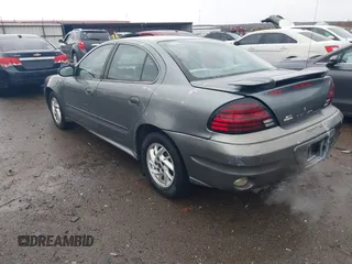 2003 Pontiac Grand Am SE1 with VIN 1G2NF52E03C273764, listed as a IAAI auction lot 41614581 with 208,369 mi miles. Bid and sale history available at carsss.com. Image 3.