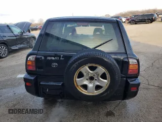 1999 Toyota RAV4 with VIN JT3GP10V9X7042801, listed as a Copart auction lot 82712874 with 256,151 mi miles and Salvage Title. Bid and sale history available at DreamBid. Image 6.