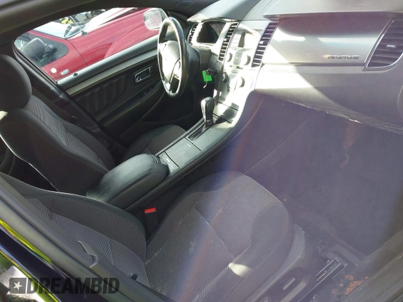 2017 Ford Taurus SEL with VIN 1FAHP2E85HG138845, listed as a IAAI auction lot 41187177 with 140,210 mi miles and . Bid and sale history available at DreamBid. Image 5.