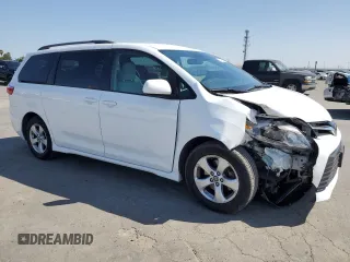 2018 Toyota Sienna LE Auto Access Seat with VIN 5TDKZ3DCXJS916445, listed as a Copart auction lot 62831275 with 104,859 mi miles and Salvage title. Bid and sale history available at DreamBid. Image 4.