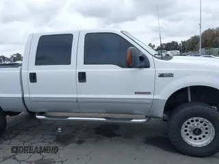 2003 Ford F-350 XL z VIN 1FTSW31P53ED77760, wystawiony jako IAAI lot #41656643 z przebiegiem 176 489 mil mil oraz . Historia ofert i sprzedaży dostępna na DreamBid. Obrazek 12.