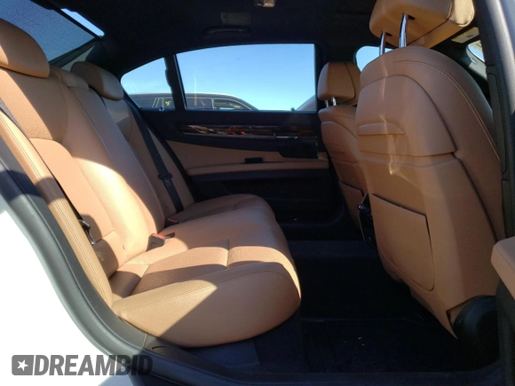 2014 BMW 7 Series 740Li xDrive with VIN WBAYF4C50ED281830, listed as a Copart auction lot 48557035 with 129,497 mi miles and Salvage Title. Bid and sale history available at carsss.com. Image 10.