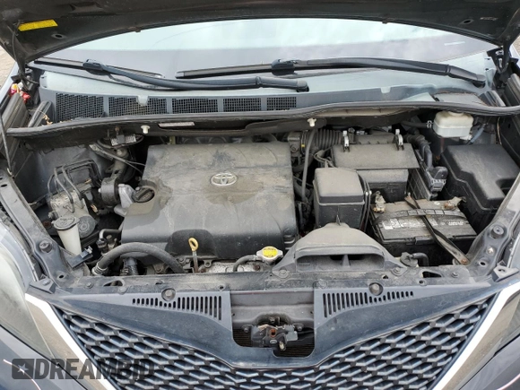 2014 Toyota Sienna SE with VIN 5TDXK3DC7ES425945, listed as a Copart auction lot 63067955 with 173,815 mi miles and Salvage title. Bid and sale history available at DreamBid. Image 11.