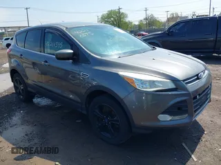 2013 Ford Escape SE with VIN 1FMCU9GX0DUA52263, listed as a IAAI auction lot 42211395 with 140,067 mi miles and . Bid and sale history available at DreamBid. Image 1.