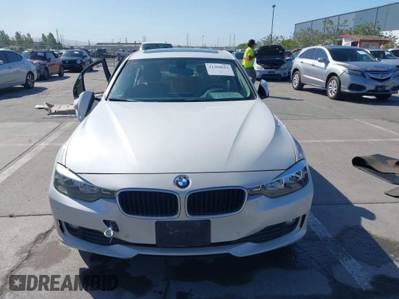 2014 BMW 3 Series 320i with VIN WBA3B1G50ENN90657, listed as a IAAI auction lot 42304612 with 129,377 mi miles and . Bid and sale history available at DreamBid. Image 13.