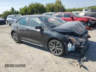 2019 Toyota Corolla Hatchback SE with VIN JTNK4RBE8K3049471, listed as a Copart auction lot 71502434 with 9,591 mi miles and Salvage Title. Bid and sale history available at carsss.com. Image 4.