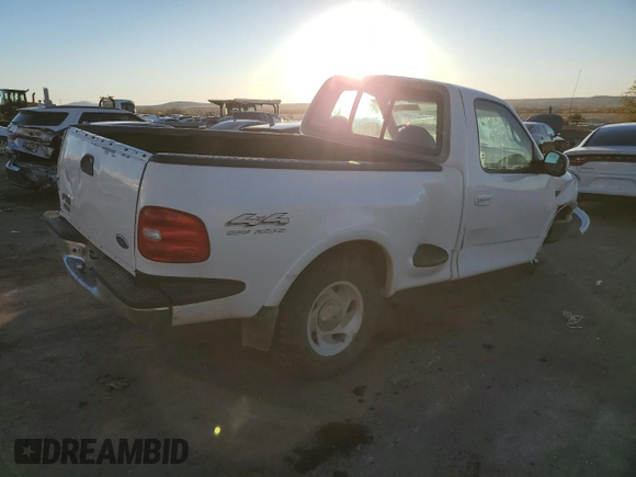 1997 Ford F-150 XL with VIN 1FTDF08W3VKD54292, listed as a Copart auction lot 80205784 with 186,944 mi miles and Salvage Title. Bid and sale history available at carsss.com. Image 3.