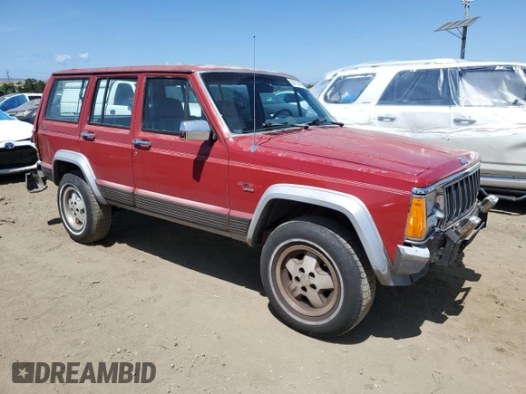 1992 Jeep Cherokee with VIN 1J4FJ58S0NL140995, listed as a Copart auction lot 56705875 with 253,657 mi miles and Salvage title. Bid and sale history available at DreamBid. Image 4.