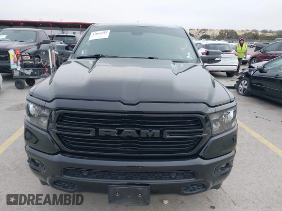 2019 Ram 1500 Big Horn z VIN 1C6RREFT1KN891182, wystawiony jako IAAI lot #41634042 z przebiegiem 128 972 mil mil oraz . Historia ofert i sprzedaży dostępna na DreamBid. Obrazek 12.
